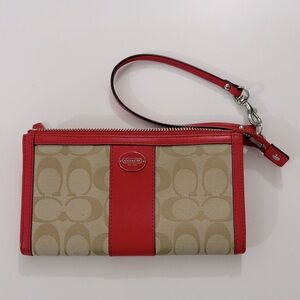 COACH Red and Tan Signature Wristlet in waterproof dust bag